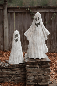 SET OF TWO PAINTED METAL GHOSTS