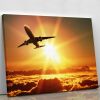 Plane takes off at sunrise Canvas Print or Poster