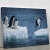 Adelie penguin jumping between two ice floes Canvas Print or Poster